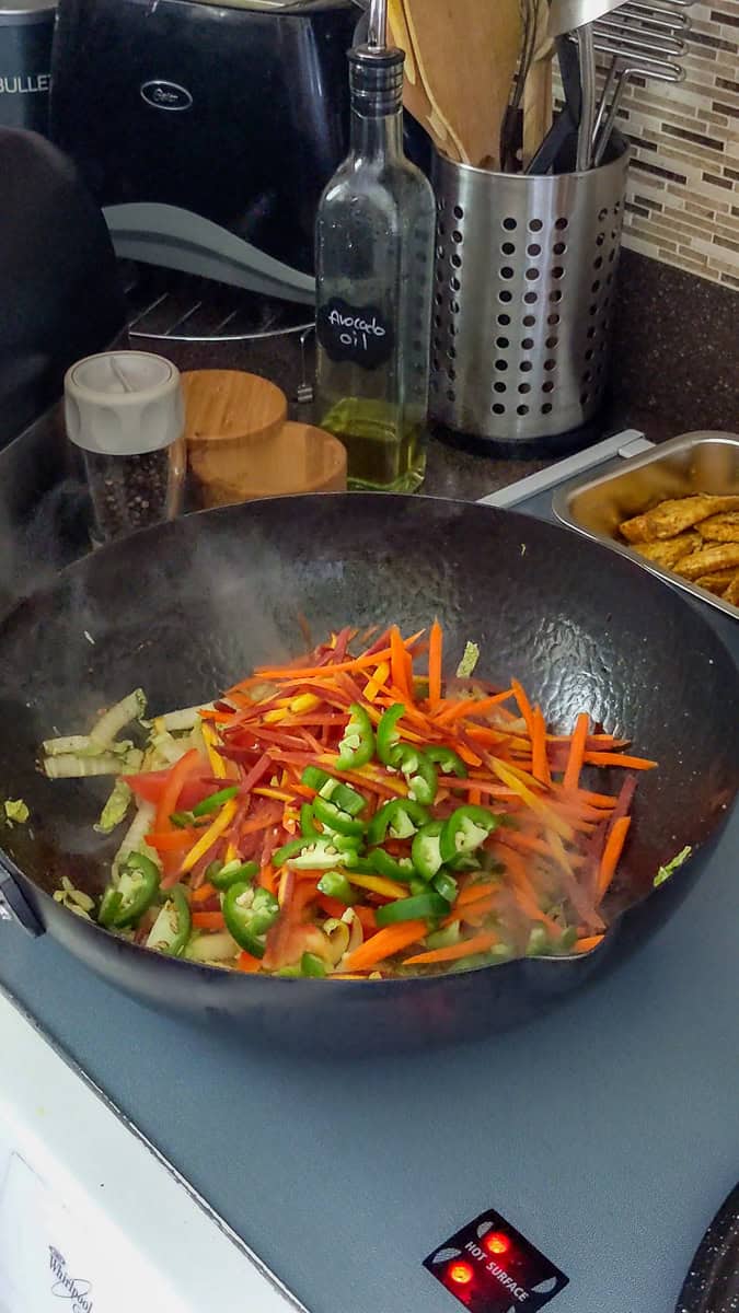 sliced varies vegetables in the hot wok.