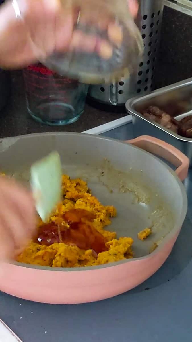 hot honey and other ingredients added to sweet potato mash.