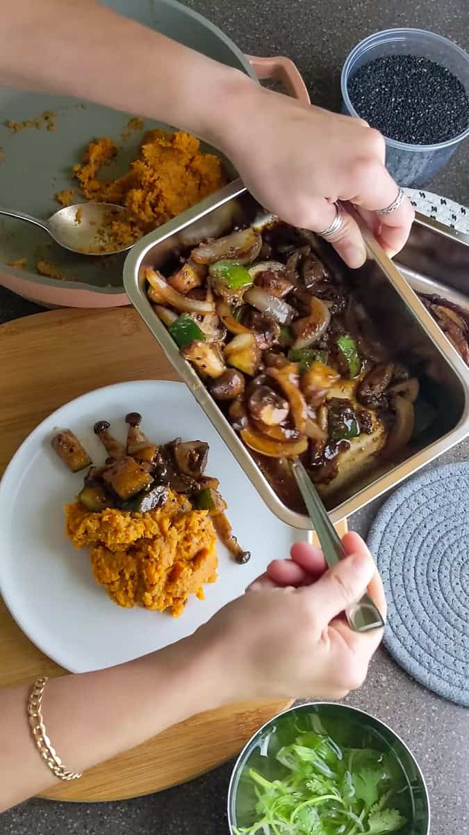 plating up the Trader Joe's Korean Short Ribs Recipe with Sweet Potatoes.