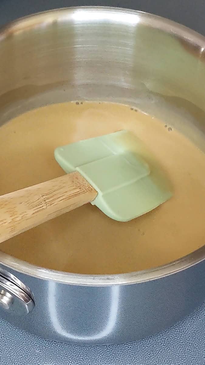 warm mixture of coconut cream and coconut sugar in a small saucepan.