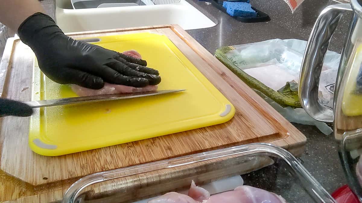 knife angled at 40 degrees to trim the fat.