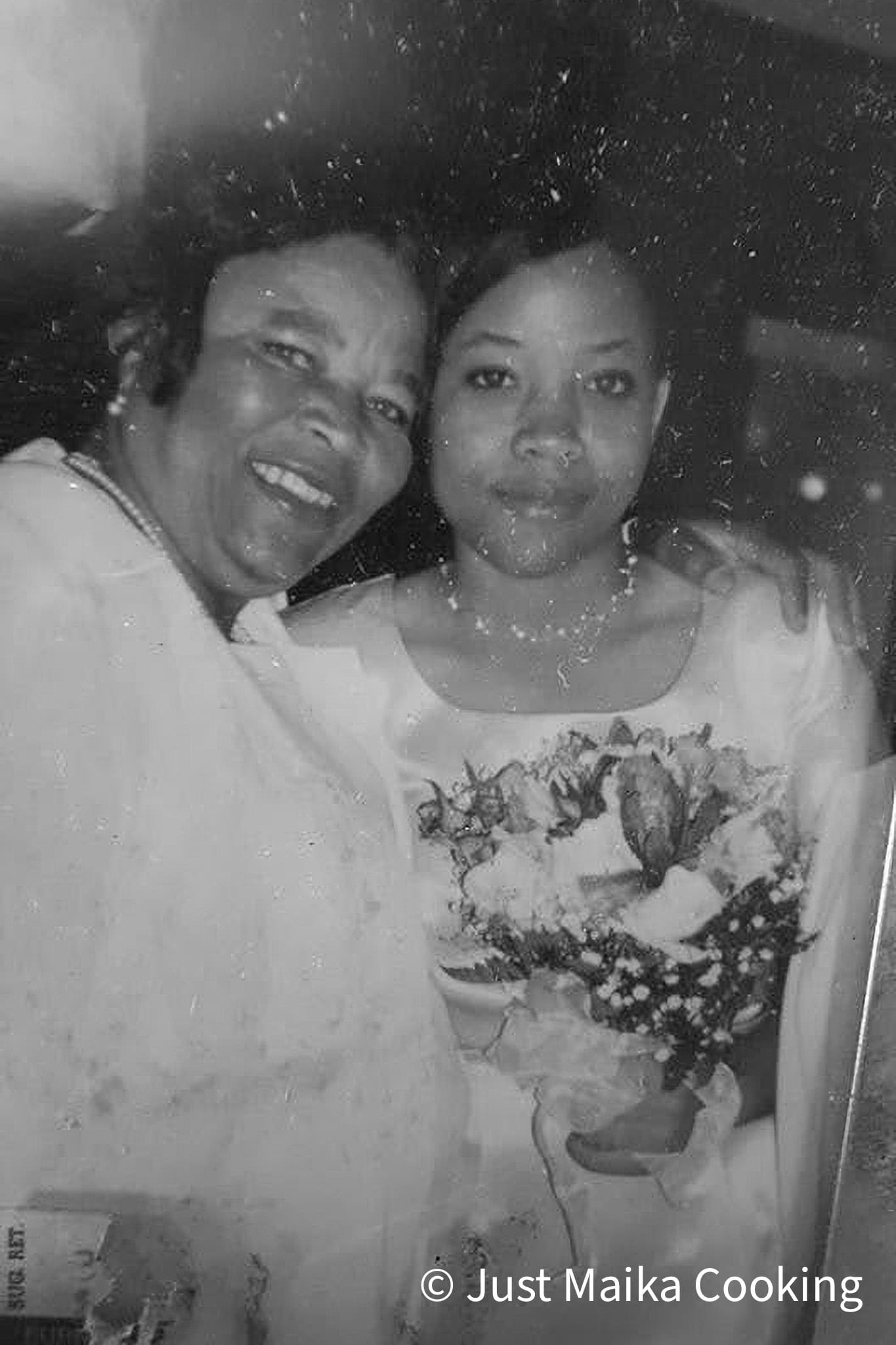 Chef maika as a teenager in a dress with flowers in hand next to her grandmother.
