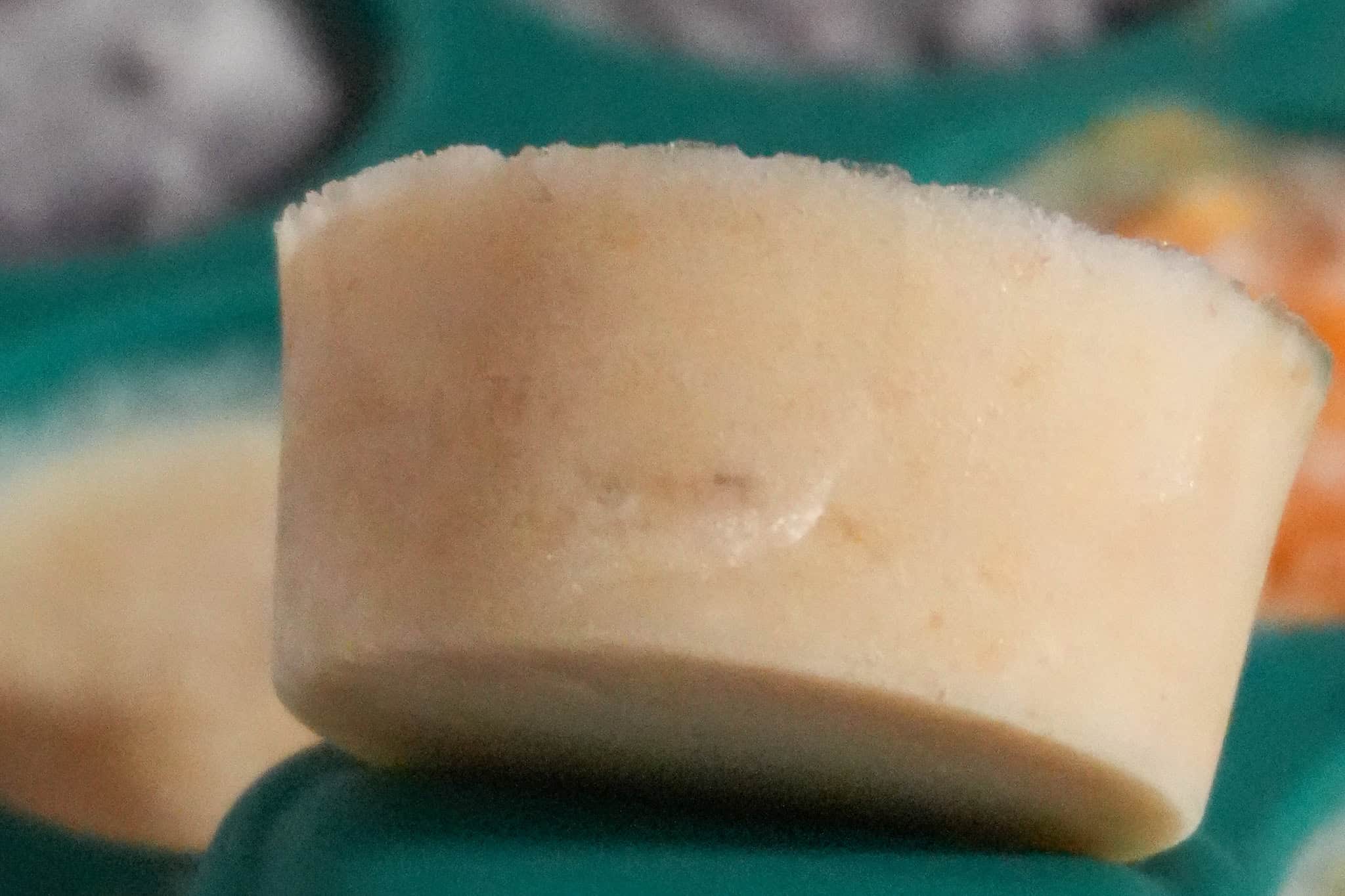 close up of frozen pureed fresh banana popped up in an anytime freezer tray.