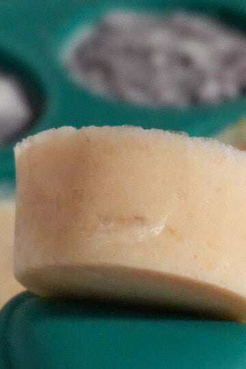 close up of frozen pureed fresh banana popped up in an anytime freezer tray.