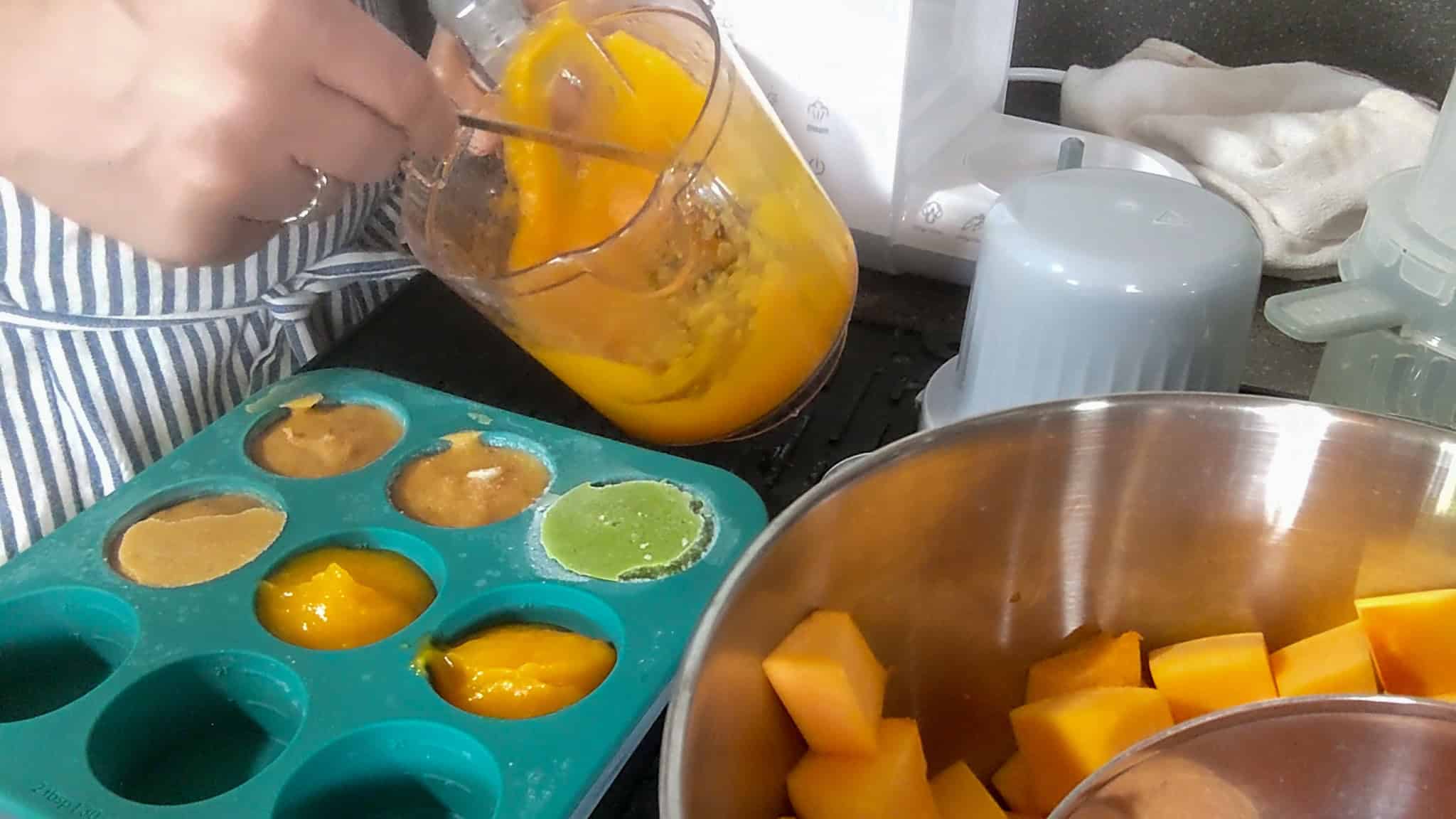 portioning butternut squash into Anytime Freezer Trays.