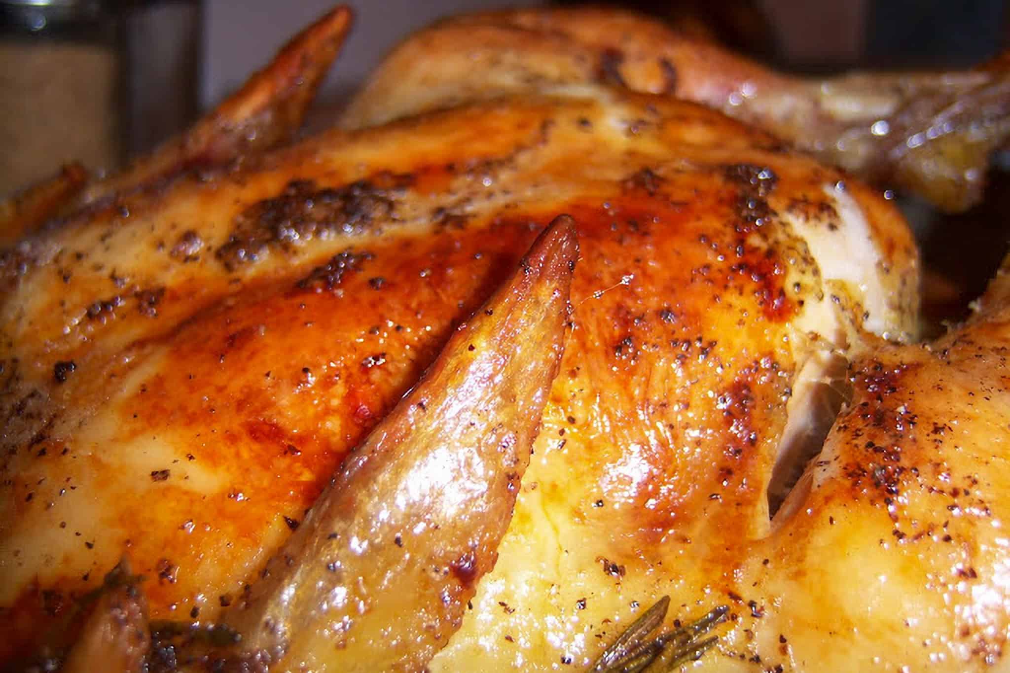 close up of homemade golden brown roasted chicken.