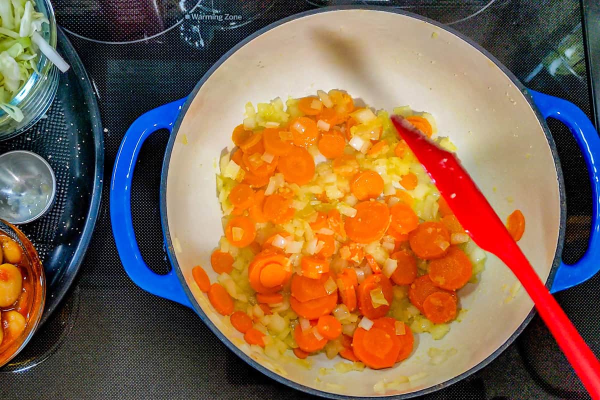 sweating diced onions and carrots in a dutch oven.